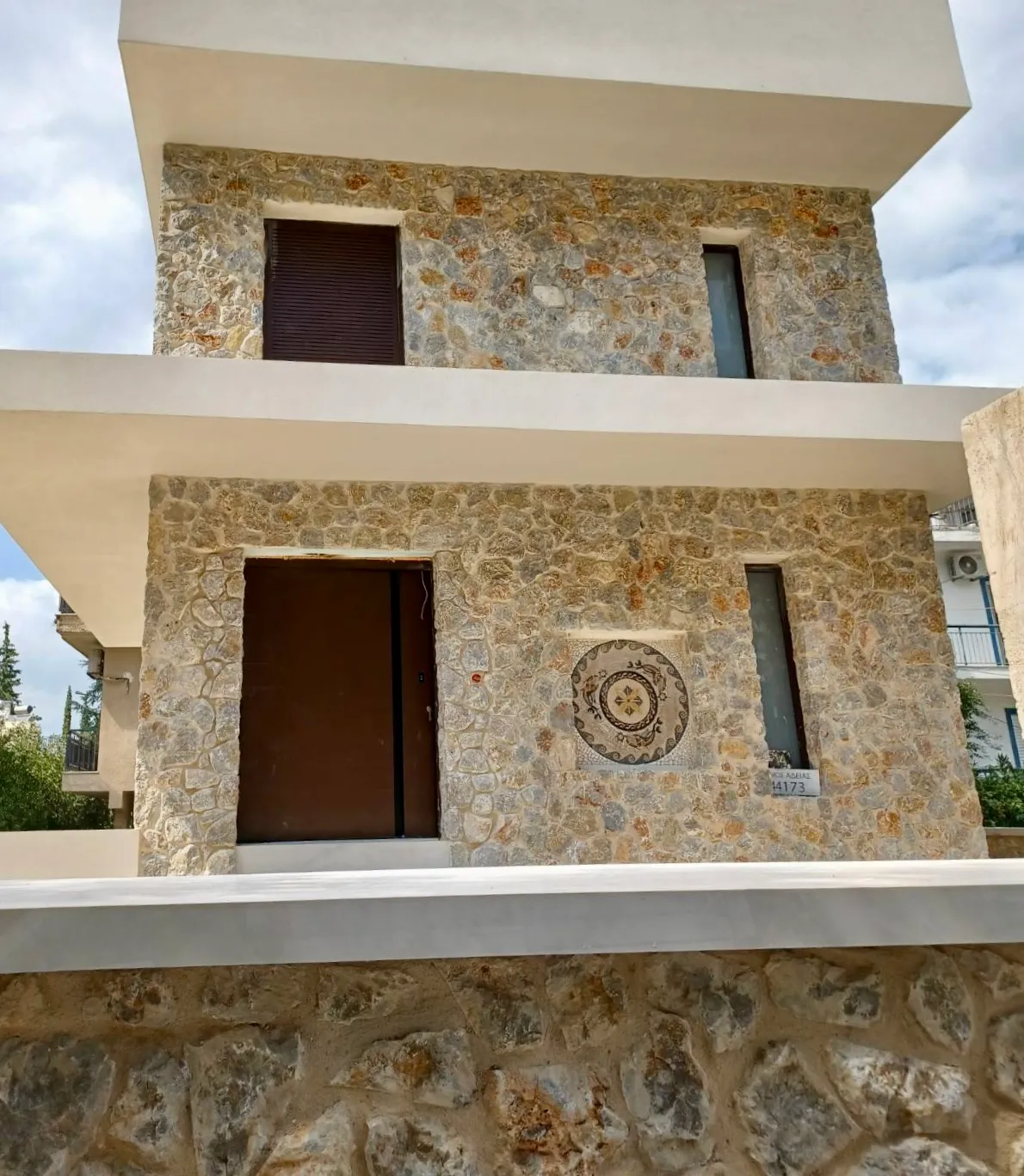 Πέτρινη όψη κατοικίας (λεπτομέρεια)